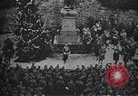 Image of American soldier giving chocolates to children France, 1918, second 60 stock footage video 65675039777