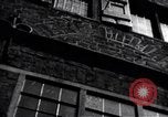 Image of buildings on Bottcherstrasse street Bremen Germany, 1937, second 9 stock footage video 65675039786