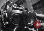 Image of diver New York City USA, 1943, second 27 stock footage video 65675039819