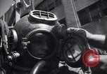 Image of diver New York City USA, 1943, second 28 stock footage video 65675039819