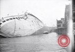 Image of SS Normandie capsized at dock New York City USA, 1943, second 1 stock footage video 65675039822