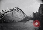 Image of SS Normandie capsized at dock New York City USA, 1943, second 3 stock footage video 65675039822