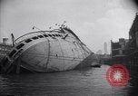 Image of SS Normandie capsized at dock New York City USA, 1943, second 4 stock footage video 65675039822