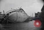 Image of SS Normandie capsized at dock New York City USA, 1943, second 5 stock footage video 65675039822