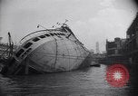 Image of SS Normandie capsized at dock New York City USA, 1943, second 6 stock footage video 65675039822