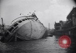 Image of SS Normandie capsized at dock New York City USA, 1943, second 7 stock footage video 65675039822