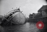 Image of SS Normandie capsized at dock New York City USA, 1943, second 9 stock footage video 65675039822