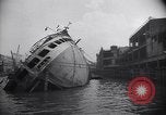 Image of SS Normandie capsized at dock New York City USA, 1943, second 10 stock footage video 65675039822