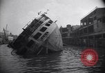 Image of SS Normandie capsized at dock New York City USA, 1943, second 13 stock footage video 65675039822