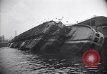 Image of SS Normandie capsized at dock New York City USA, 1943, second 16 stock footage video 65675039822