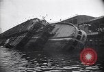 Image of SS Normandie capsized at dock New York City USA, 1943, second 21 stock footage video 65675039822
