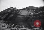 Image of SS Normandie capsized at dock New York City USA, 1943, second 22 stock footage video 65675039822