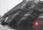Image of SS Normandie capsized at dock New York City USA, 1943, second 28 stock footage video 65675039822