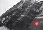 Image of SS Normandie capsized at dock New York City USA, 1943, second 31 stock footage video 65675039822