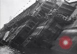 Image of SS Normandie capsized at dock New York City USA, 1943, second 32 stock footage video 65675039822