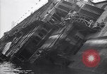Image of SS Normandie capsized at dock New York City USA, 1943, second 33 stock footage video 65675039822