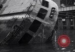 Image of SS Normandie capsized at dock New York City USA, 1943, second 34 stock footage video 65675039822