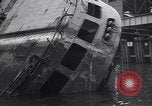 Image of SS Normandie capsized at dock New York City USA, 1943, second 36 stock footage video 65675039822