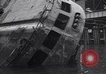 Image of SS Normandie capsized at dock New York City USA, 1943, second 37 stock footage video 65675039822