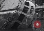 Image of SS Normandie capsized at dock New York City USA, 1943, second 38 stock footage video 65675039822