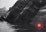 Image of SS Normandie capsized at dock New York City USA, 1943, second 39 stock footage video 65675039822
