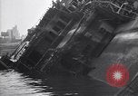 Image of SS Normandie capsized at dock New York City USA, 1943, second 40 stock footage video 65675039822