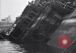 Image of SS Normandie capsized at dock New York City USA, 1943, second 41 stock footage video 65675039822