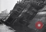 Image of SS Normandie capsized at dock New York City USA, 1943, second 42 stock footage video 65675039822