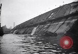 Image of SS Normandie capsized at dock New York City USA, 1943, second 43 stock footage video 65675039822