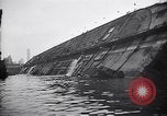 Image of SS Normandie capsized at dock New York City USA, 1943, second 44 stock footage video 65675039822