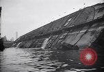 Image of SS Normandie capsized at dock New York City USA, 1943, second 45 stock footage video 65675039822