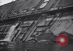 Image of SS Normandie capsized at dock New York City USA, 1943, second 48 stock footage video 65675039822