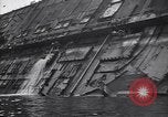 Image of SS Normandie capsized at dock New York City USA, 1943, second 51 stock footage video 65675039822