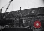 Image of SS Normandie capsized at dock New York City USA, 1943, second 55 stock footage video 65675039822