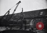 Image of SS Normandie capsized at dock New York City USA, 1943, second 57 stock footage video 65675039822