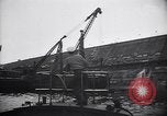 Image of SS Normandie capsized at dock New York City USA, 1943, second 59 stock footage video 65675039822