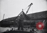 Image of SS Normandie capsized at dock New York City USA, 1943, second 60 stock footage video 65675039822