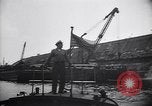 Image of SS Normandie capsized at dock New York City USA, 1943, second 61 stock footage video 65675039822