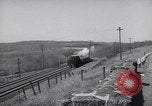 Image of Steam locomotives pulling ore-carrier trains United States USA, 1957, second 55 stock footage video 65675039825