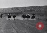 Image of old cattlemen racing horses United States USA, 1927, second 13 stock footage video 65675039843