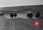 Image of old cattlemen racing horses United States USA, 1927, second 14 stock footage video 65675039843