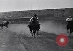 Image of old cattlemen racing horses United States USA, 1927, second 15 stock footage video 65675039843