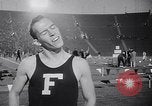 Image of track meet Los Angeles California USA, 1955, second 30 stock footage video 65675039871