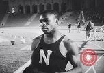 Image of track meet Los Angeles California USA, 1955, second 50 stock footage video 65675039871
