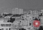 Immagine di White ONU van visualizzando una bandiera bianca Tripoli in Libia, 1962, secondo 14 filmato di repertorio 65675039879
