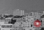 Immagine di White ONU van visualizzando una bandiera bianca Tripoli in Libia, 1962, secondo 16 filmato di repertorio 65675039879