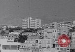 Immagine di White ONU van visualizzando una bandiera bianca Tripoli in Libia, 1962, secondo 17 filmato di repertorio 65675039879