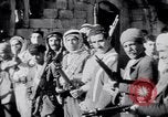 Image of Armed Arab civilian militia brandishing weapons Tripoli Libya, 1962, second 8 stock footage video 65675039880