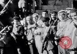 Image of Armed Arab civilian militia brandishing weapons Tripoli Libya, 1962, second 9 stock footage video 65675039880