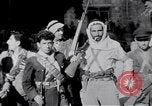 Image of Armed Arab civilian militia brandishing weapons Tripoli Libya, 1962, second 23 stock footage video 65675039880